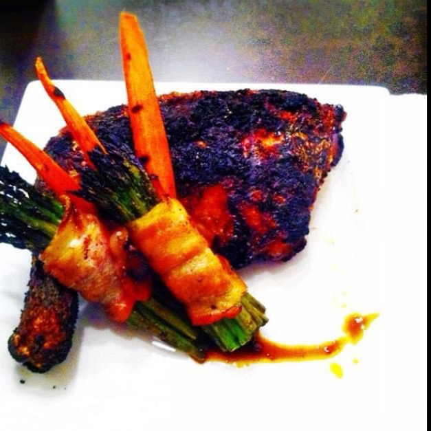 Blackened rotisserie quarters with roasted carro