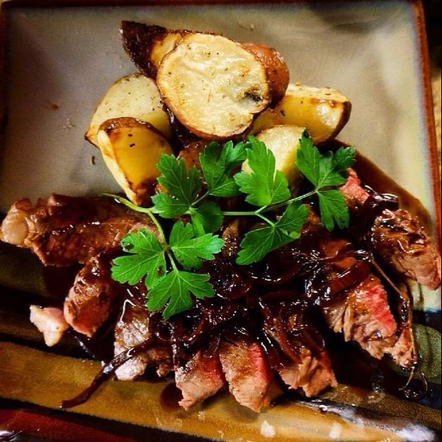 Pan seared ribeye with Demi glas and rosemary ro